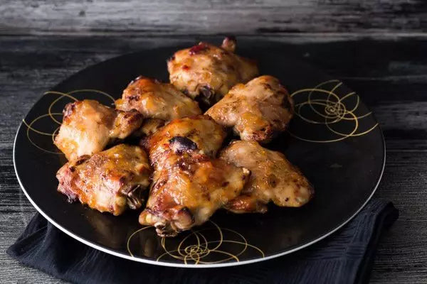 Oven-Roasted Chicken Thighs with Roasted Pineapple Habanero Sauce