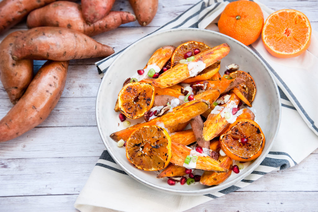 Spiced Sweet Potatoes with Charred Satsumas, Pecans, and Pomegranate Yogurt Dressing