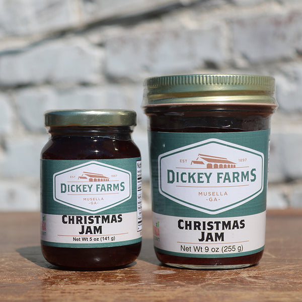 two jars of dickey farms christmas jam on a table