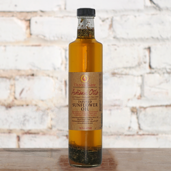 a bottle of infused sunflower oil from olive farm