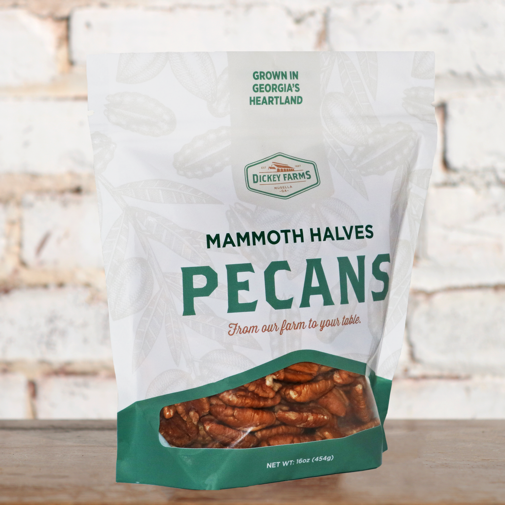 a bag of pecans is sitting on a wooden table .