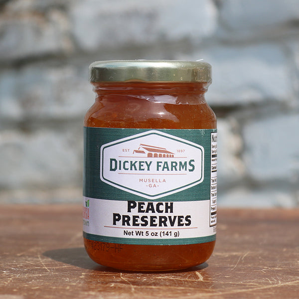 a jar of peach preserves from dickey farms