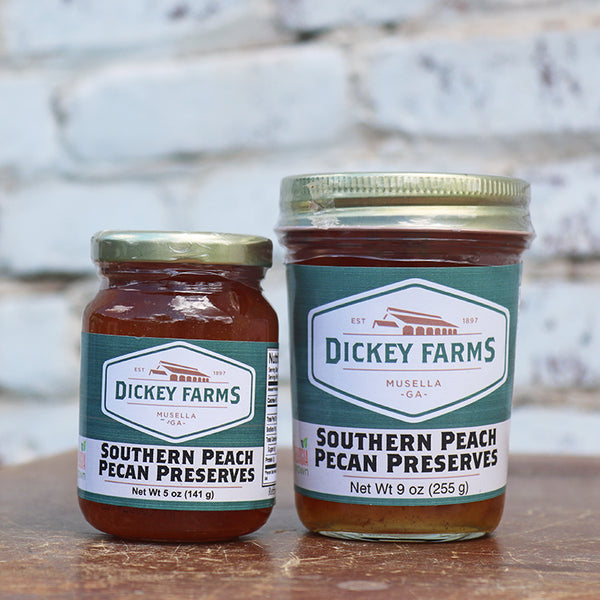 two jars of dickey farms southern peach pecan preserves