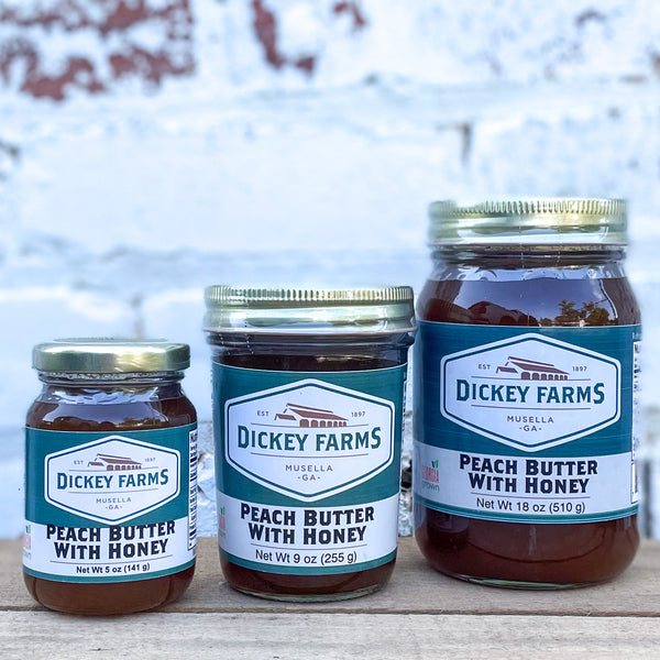 three jars of dickey farms peach butter with honey