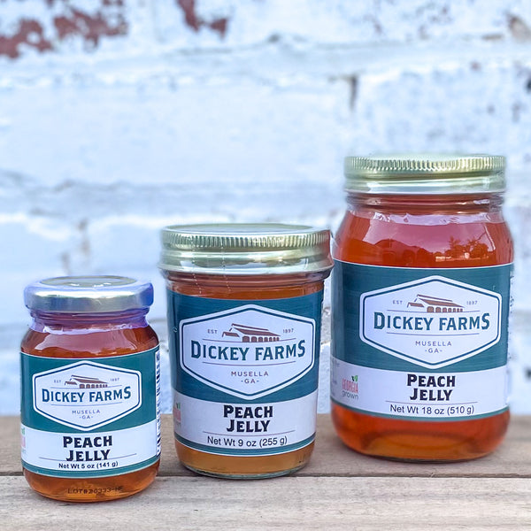 three jars of peach jelly from dickey farms