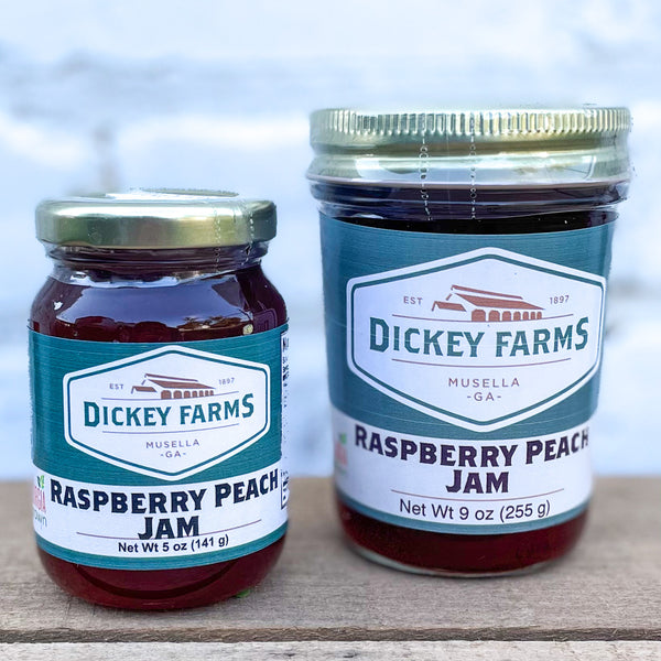 two jars of dickey farms raspberry peach jam